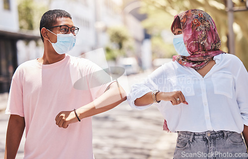 Image of Covid handshake, elbow greeting and friends welcome of people with a mask outdoor. Couple together with social distance welcome for city outing and fun in summer with friendship or romantic love
