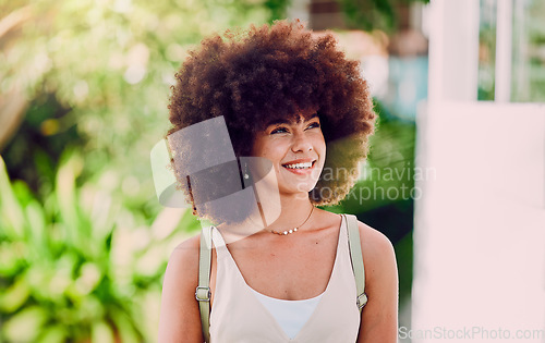 Image of Black woman, girl and smile outdoor for wellness, break and enjoy holiday. Young female, lady and afro for confidence, happiness and relax in city, casual and trendy being stylish, edgy and chill.