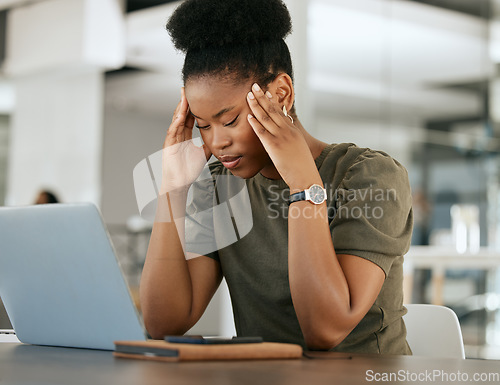 Image of Stress, headache and black woman with laptop in office tired, exhausted and worry from overworked job. Burnout, mental health and frustrated female employee in pain, stressed from working on computer