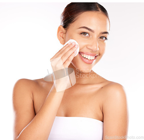 Image of Beauty, portrait and woman in studio with cotton pad for skincare, cleaning and makeup removal on white background. Face, facial and swab with girl model for skin, product and cleanser with mockup