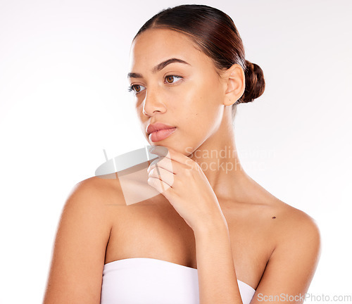 Image of Thinking, skincare and studio woman for beauty, cosmetics and makeup idea, inspiration or marketing on white background. Glow, shine and healthy skin care of young girl model for dermatology results