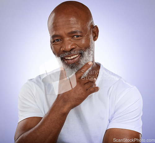 Image of Studio portrait of happy senior black man with smile, confident face and standing on studio background. Fashion, retirement and profile picture of trendy old man from Nigeria, male model from Africa.