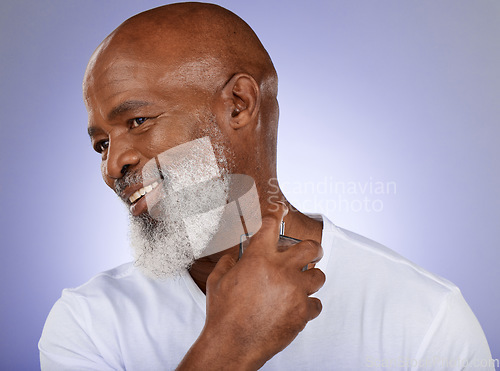 Image of Man, perfume and cologne bottle on studio background for mature cosmetics, luxury wellness or body spray. Smile, happy and black model with parfum fragrance on purple mock up backdrop for clean smell