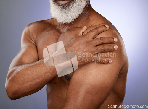 Image of Hand, arm pain and senior man in studio for injury, arthritis and joint ache on blue gradient background. Chest, elderly man and shoulder pain with mockup for heart attack, distress and cardiac sign