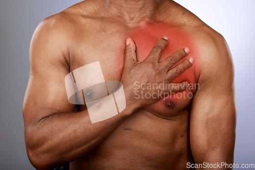 Image of Heart attack, pain and black man with hand on chest in studio for heart health, medical care and stroke. Cardiology, healthcare and male holding torso with inflammation from cardiovascular disease