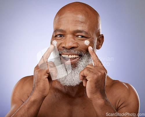 Image of Portrait, skincare and senior black man with face cream in studio on background. Beauty, retirement and elderly male model from Nigeria with facial lotion, creme or cosmetics product for healthy skin