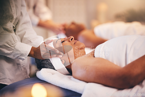 Image of Spa, massage and head of senior woman while on table to relax for calm, peace and zen time with a therapist for health and wellness. Patient get facial with cosmetics, skincare and detox treatment