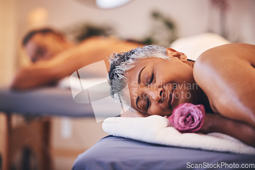 Image of Relax, couple and massage at a spa for senior people on a table for wellness, zen and skincare treatment. Peace, luxury and senior woman happy with flower, aromatherapy and relaxation in Thailand