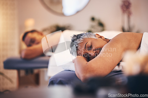 Image of Mature couple, massage or spa date in relax hotel salon, healthcare wellness clinic or skincare beauty retreat. Woman, man or lying customer in aromatherapy treatment, stress management or self care