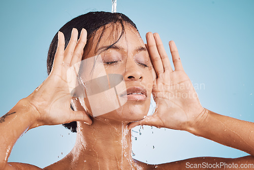 Image of Beauty, face and black woman in shower with water for skincare and hygiene, skin hydration and facial with treatment for grooming. Clean, cosmetics and skin care with hands frame, washing and fresh.