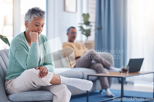 Image of Divorce, thinking and sad old couple in counseling after a fighting about money, debt or financial problems at home. Stressed, mental health and angry senior woman in therapy with marriage partner