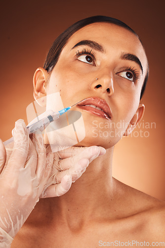 Image of Beauty, face and injection from doctor doing collagen lips treatment for cosmetic change. Plastic surgery, lip filler and skincare for youth, dermatology and skin care of a young woman with glow