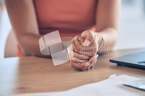 Image of Anxiety, depression and hands of black woman with stress, abuse trauma or secret domestic violence at a counseling table. Sad, scared or depressed young girl in pain or fear from rape or sexual abuse