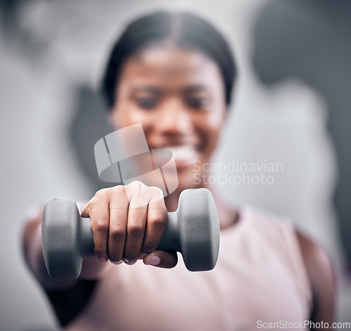 Image of Weights, fitness and black woman training at gym, body motivation and muscle exercise. Sports hand, weightlifting and portrait of an African athlete with health workout, power and strong cardio