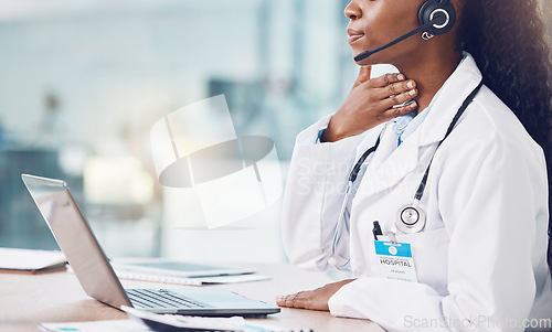 Image of Healthcare, video call and a doctor consulting online. Communication, technology and innovation, a black woman or medical worker using laptop and internet to consult from hospital office