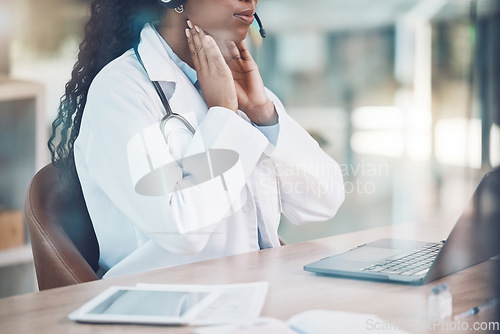 Image of Doctor, explaining and online consultation using laptop for a virtual checkup for throat or covid while sitting in hospital office. Female medical insurance assistant on video call for telemedicine