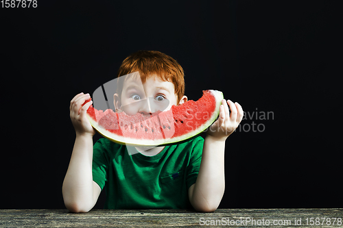 Image of bitten red sweet watermelon