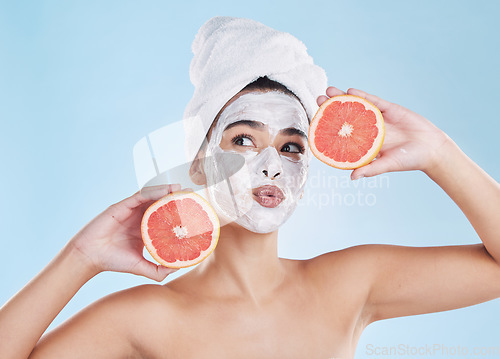 Image of Skincare woman with fruit skin, health and face mask for wellness, health and face product. Portrait of healthy, facial and nutrition with beauty, luxury and food or organic citrus in girl model hand