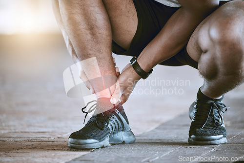 Image of Sports, injury and fitness ankle pain during exercise, running and training outside with red color on foot, muscle or joint. Man, risk and hurt hands athlete holding broken leg bone with bad bruise