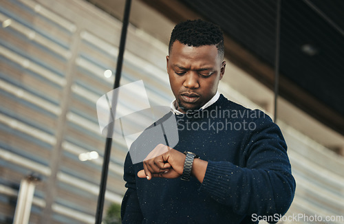 Image of Time, watch at an airport for travel with a businessman looking at his wristwatch. Entrepreneur check the hour for a flight, an appointment or an airplane schedule in the morning to get transport