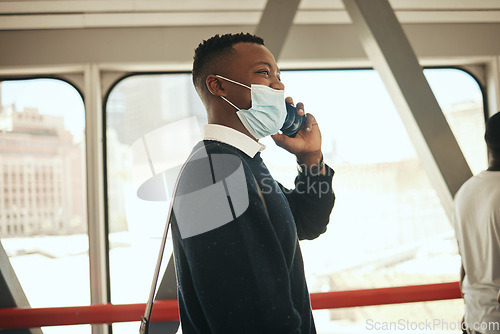 Image of Covid, face mask and working man on call while travelling to office. Pandemic regulations and safety while commuting in the city. Business person communication on phone with remote colleagues.