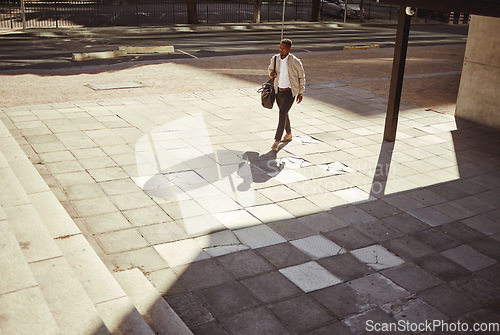 Image of Urban city, travel and businessman walking to work, job or business career. Corporate worker man carrying bag on business travel, traveling or walking to the airport for an overseas opportunity