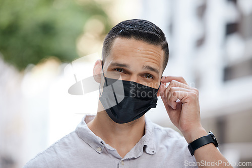 Image of Freedom, end of covid and man removing face mask after corona virus with bokeh urban city. Trust and compliance in post covid 19 portrait or headshot of young person free after getting vaccine