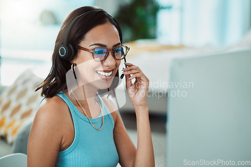 Image of Call centre, customer service and agent with computer talking to customers, helping or answering calls in office. Smiling, happy or friendly helpdesk operator, secretary and contact us client support