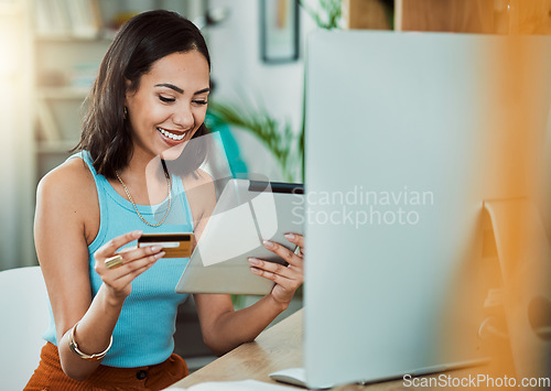 Image of Online shopping with credit card and tablet while paying for her streaming subscription or bill. Happy woman enjoy break and online shopping or purchasing items on eCommerce website with fintech app