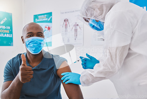Image of Thumbs up, vaccine and covid injection on a mans arm with him wearing a mask to stay safe. Doctors needle injecting a healthy male protecting against corona virus by taking treatment in a hospital