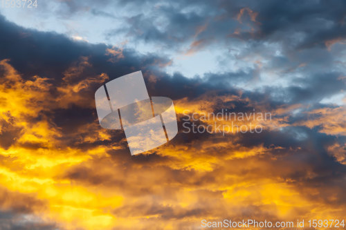 Image of dark clouds and bright sunlit sky