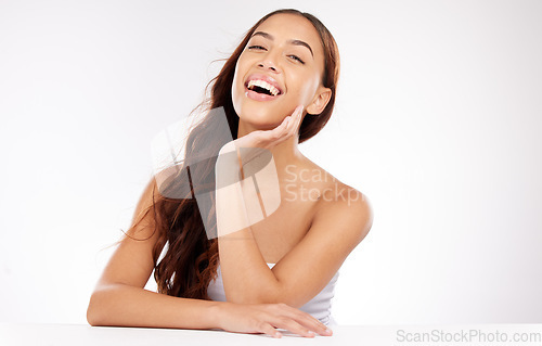 Image of Portrait of laughing woman, skincare and hair care for beauty, cosmetics and makeup, wellness and cosmetology on white studio background. Happy model, facial aesthetics and clean dermatology for body