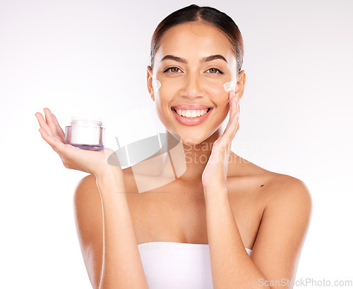 Image of Beauty, skincare and face cream for woman with dermatology product glow, health and wellness on white studio background. Portrait of Colombia model with smile and happy for result of cosmetic mockup