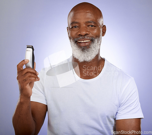 Image of Elderly black man, beard to shave with beauty and grooming, hygiene and clean with skincare against studio background. Shaver, shaving and cosmetic portrait, hair removal and face care with wellness.