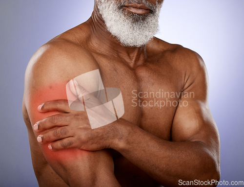 Image of Senior, pain and black man with arm muscle inflammation from athlete bicep or workout injury. Athletic, injured and mature model touching muscular body tension with purple studio background.