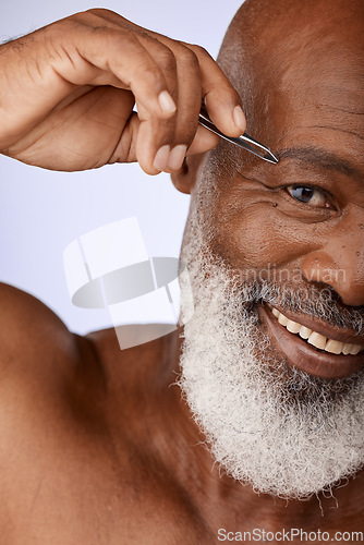 Image of Face, eyebrow tweezers and senior black man in studio isolated on a purple background. Portrait, hygiene and elderly male model plucking eyebrows or hair removal for beauty, wellness and grooming.