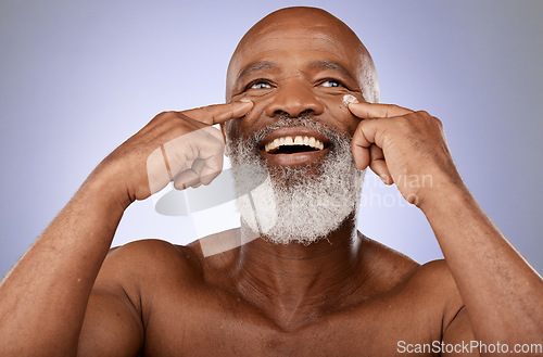 Image of Skincare cream, senior beauty and black man thinking sunscreen, dermatology and face glow on a purple background in studio. Spa idea, moisturiser smile and elderly model with lotion for facial health