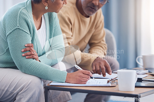 Image of Senior couple, documents and sign contract for life insurance or home mortgage. Discussion, signature and retired elderly man and woman signing legal paperwork for will or loan application together.