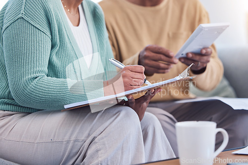 Image of Retirement, couple and hands writing on documents for loan, financial or investment application. Marriage, finance and paperwork signature decision of senior woman in home with husband.