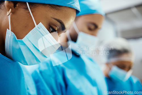Image of Health, doctor with face mask and surgery, surgeon and operating room, hospital and healthcare zoom. Professional, operation and focus with medical team, working and health care emergency at clinic.