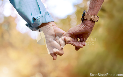 Image of Retirement, senior couple and holding hands for love, romance and bonding together. Romantic, hand gesture and loving for relationship, marriage and support for anniversary, retired and healthcare.