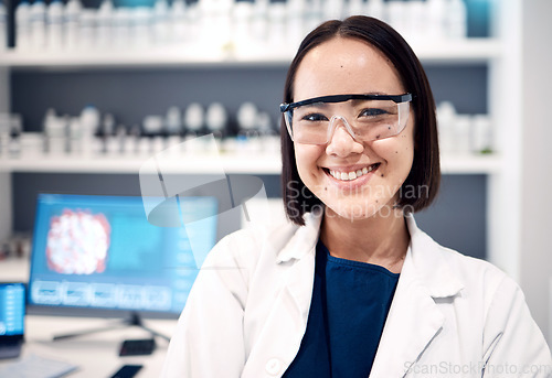 Image of Pharmaceutical, asian and science woman in portrait with technology innovation, research vision and expert knowledge in laboratory. Computer screen, scientist and chemistry medical worker in lab gear