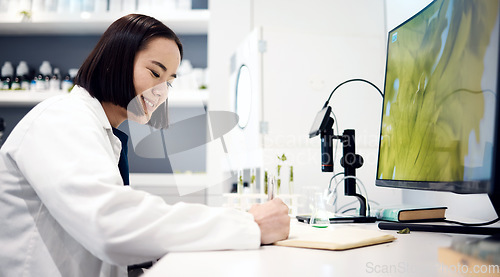 Image of Scientist, planning and asian woman working in lab for research innovation, writing results or science analytics at desk. Laboratory, forensic biology and happy medical physician write report notes