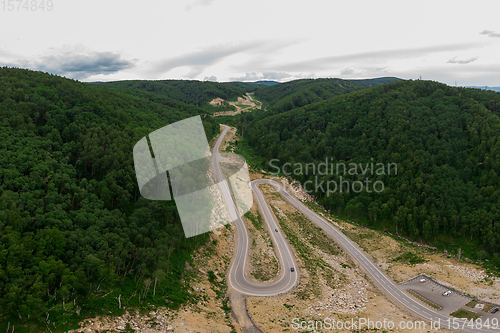 Image of Aerial top vew of winding road in the mountains