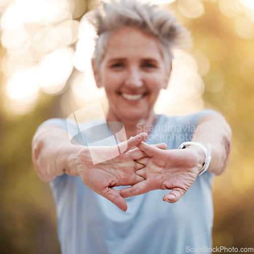 Image of Senior woman, runner stretching hands in park for running, exercise or wellness with smile. Elderly female training, muscle health and warm up for workout, self care and healthy development outdoor