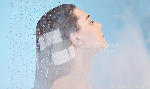 Image of Wet shower, water and woman in bathroom doing body care, hygiene and cleaning. Water drops, care and person doing skincare, wellness and relax wash with liquid and spa steam for healthy skin