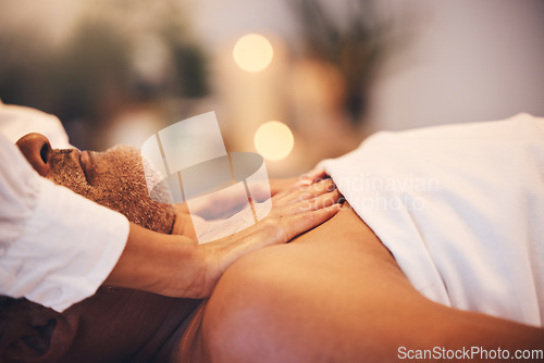 Image of Massage, spa and therapist hands with man client in luxury, zen or calm room with physical therapy, wellness and vacation healing. Bokeh, healthcare service and beauty worker giving a body treatment