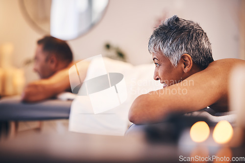 Image of Senior woman, spa and man on massage bed with happiness, peace and relax for health getaway. Couple, wellness and physical therapy in salon, holistic body treatment and blurred background in Jakarta