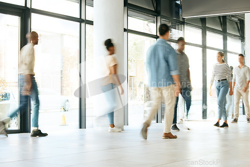 Image of Business people, busy office and walking fast at work, diversity and productive with blur, moving and company growth. Staff, corridor and walk with speed, men and women in the workplace with motion