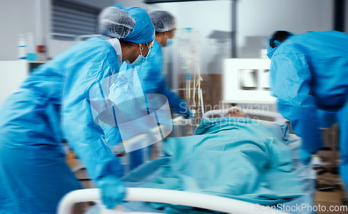 Image of Women, man and hospital bed in motion blur of emergency surgery, healthcare wellness or risk condition operation. Doctors, nurses and medical workers with patient in busy er, theatre room or teamwork